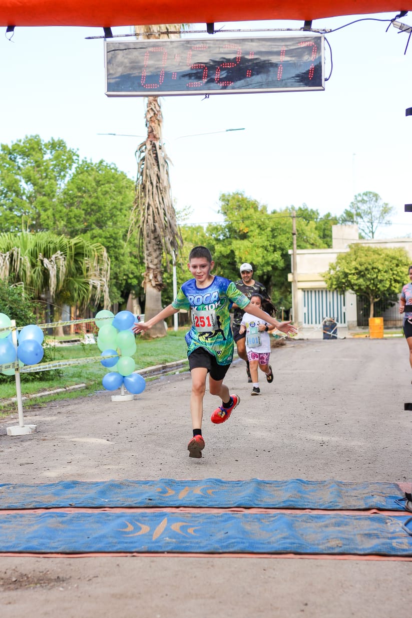 Ticiano Benavidez Crossing the Finish Line in Argentina Ticiano Benavidez crosses the finish line during a running event in Argentina. The young runner from Santa Fe celebrates as he completes the race, showcasing the determination and passion that led him to become the Dare to Dream Argentina winner.